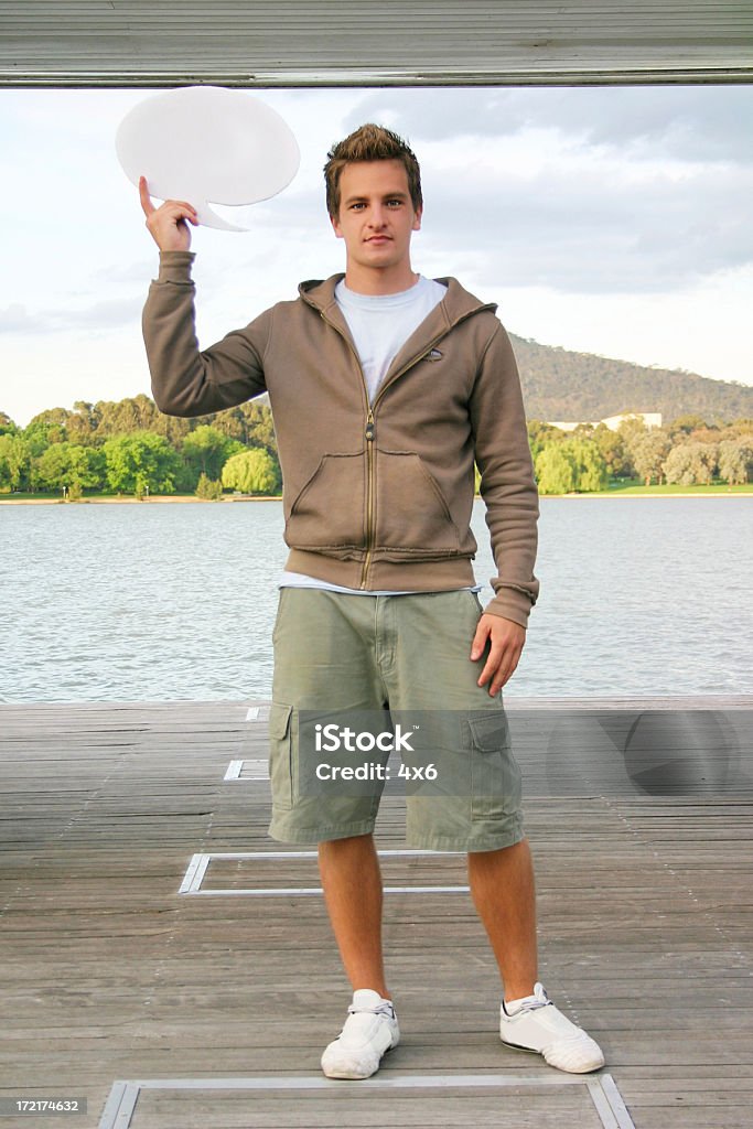 Casual uomo con nuvoletta - Foto stock royalty-free di Abbigliamento casual