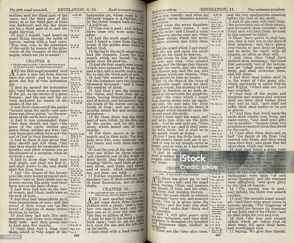Bible Pages Hi-res of an antique bible open to Revelations. Page Stock Photo