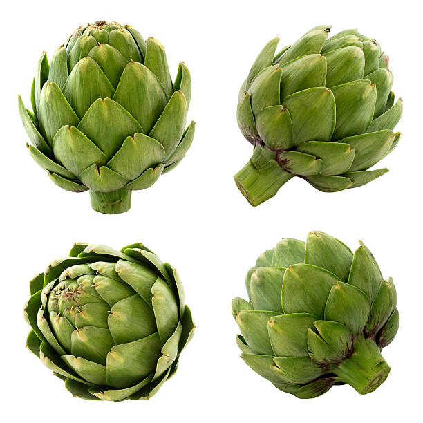 Artichokes on white background Close-up and detailed shots of fresh artichokes from various angles. artichoke stock pictures, royalty-free photos & images