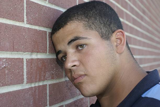 Young Man Expressing Sadness stock photo