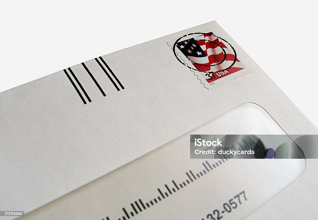 Bill Payment Bill payment with a cancelled 37 cent US Flag postage stamp. Envelope is isolated on a white background. Mail Stock Photo