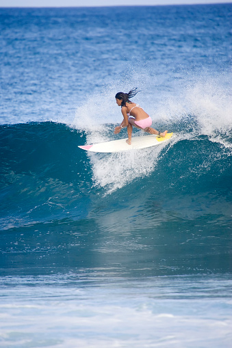 Young Girl Surfing  the Lip
