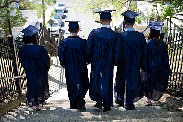 istock Graduates walking down the stairs from behind 172177485