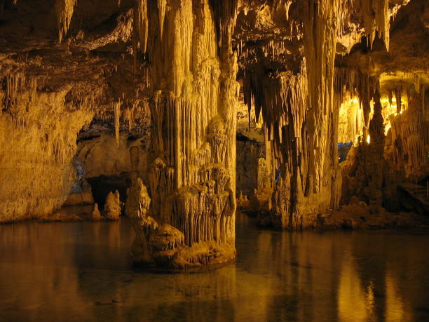 istock Golden interior of a cave with stalactites 172177537