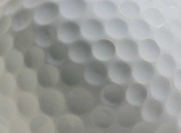 pallina da golf-macro - golf ball circle ball curve foto e immagini stock