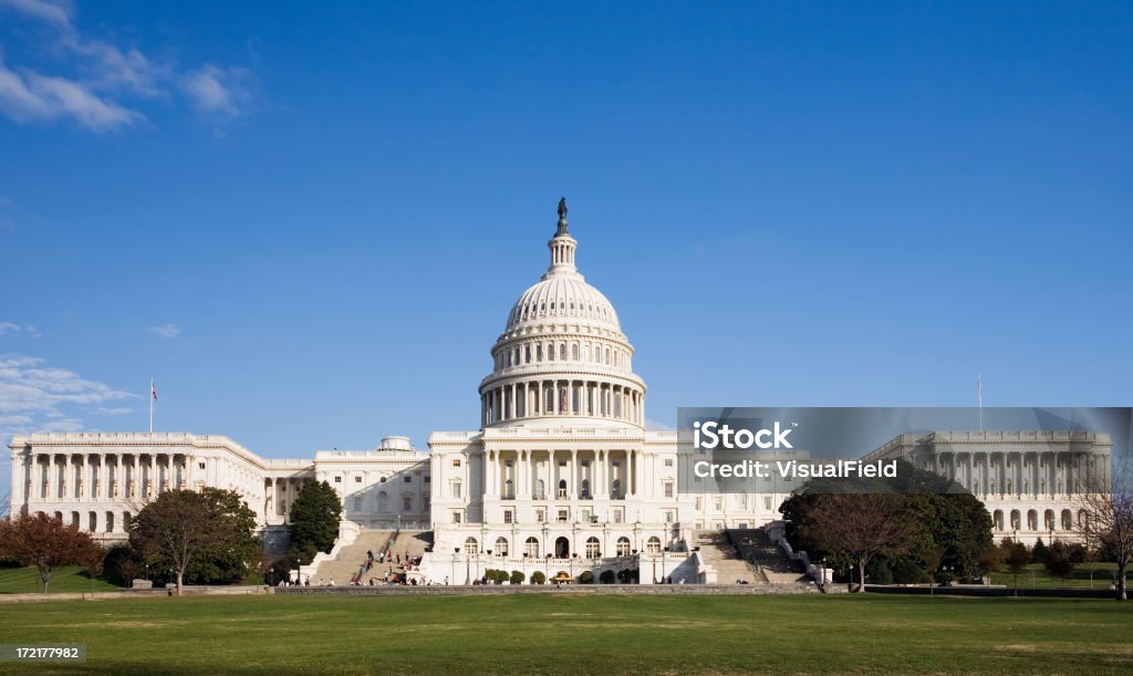 United States Capitol Building wide-angle view of the United States Capitol Building in Washington, DC, on a clear day Capitol Building - Washington DC Stock Photo