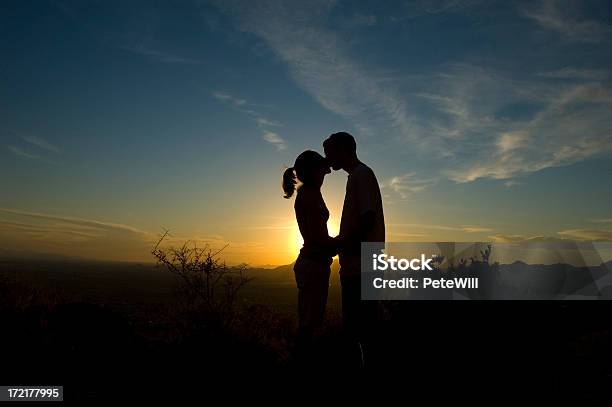 Sunset Kiss Stock Photo - Download Image Now - Adult, Affectionate, Back Lit