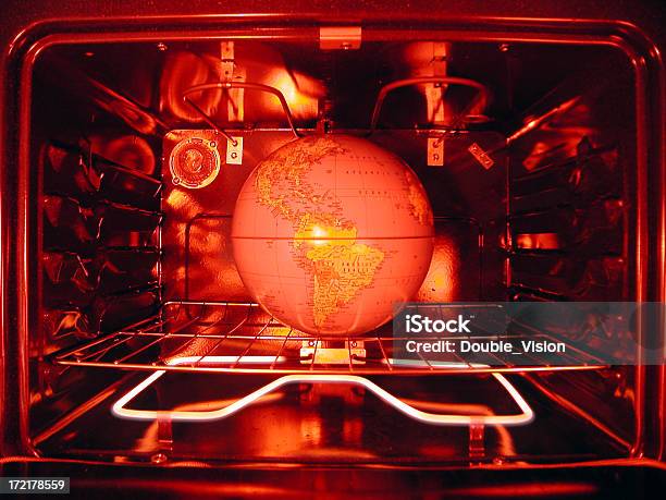 Global Warming Concept Redtinted Earth Globe In Oven Stock Photo - Download Image Now