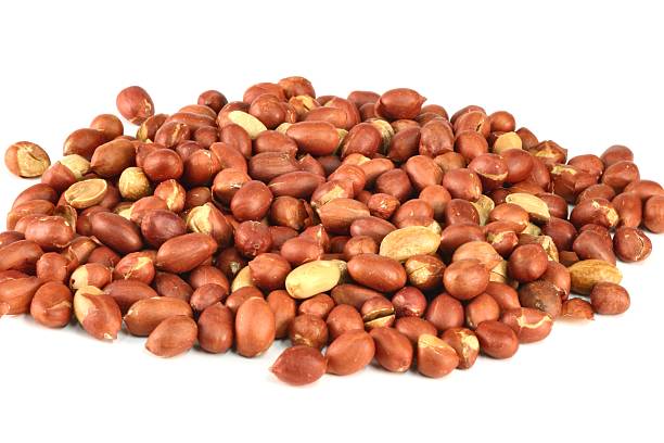 Spanish Peanuts in pile on white stock photo