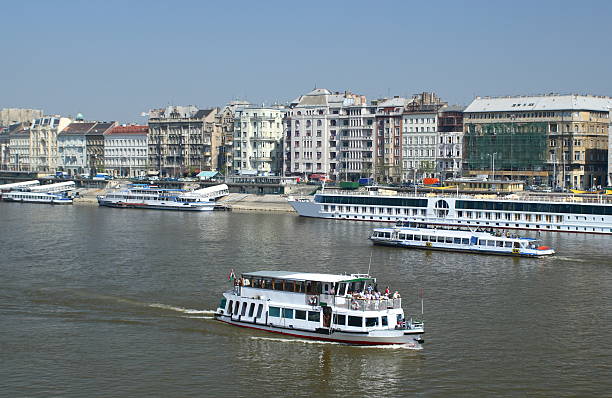 Boats on the Danube in Budapest Boats on the Danube in Budapest budapest danube river cruise hungary stock pictures, royalty-free photos & images