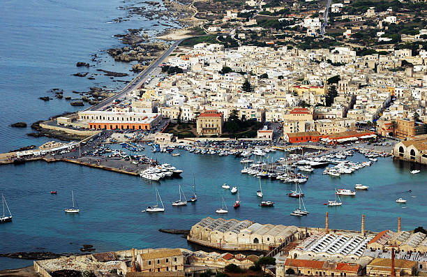 mediterranean small harbour "Aerial view of a small harbour of a mediterranean island. It's Favignana, in Sicily (Italy)." egadi islands photos stock pictures, royalty-free photos & images