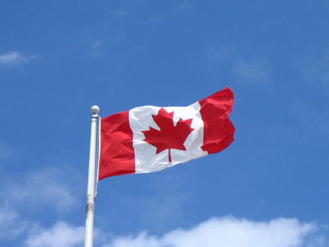 Canada Flag on Flagpole by Evening Sunset Sky, drapeau canadien
