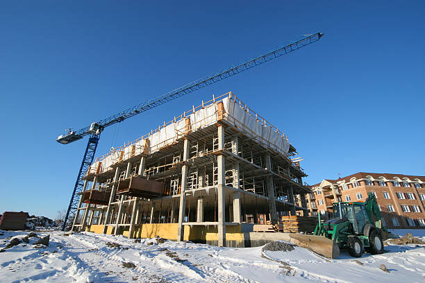 Construction Site and Crane in Winter stock photo