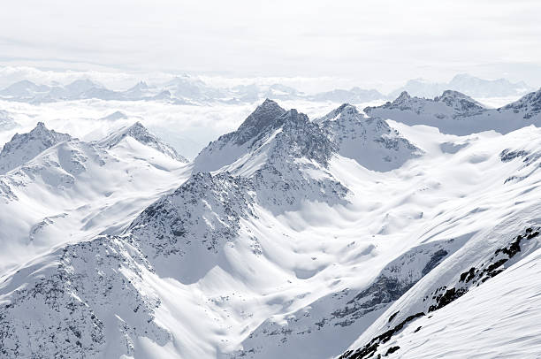 Aerial view of snow covered Swiss Alps  stock photo
