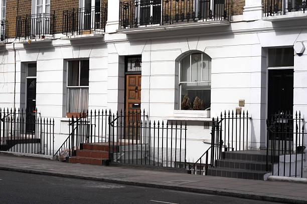 istock London townhouses white road fronts 172180885
