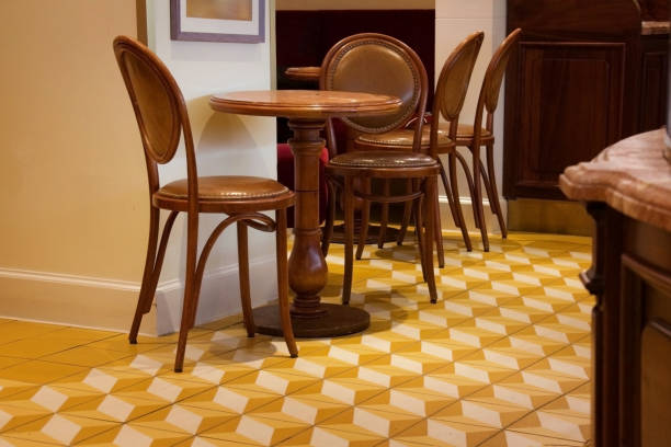 istock inviting empty cafe tables and chairs in a cozy and warm interior 1721815443