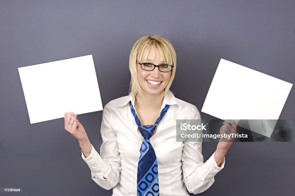 Two Signs Fun blonde woman holds two blank signs. Adult Stock Photo