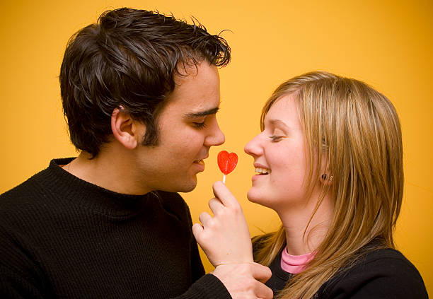 共有する - child valentines day candy eating ストックフォトと画像