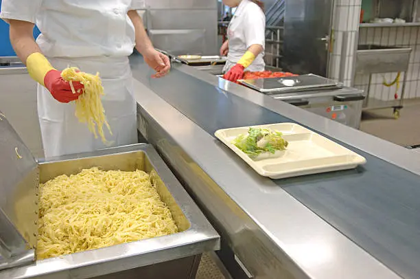 preparing meals in a canteen of a university