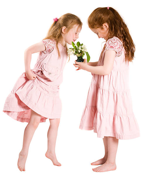 istock Young girls with flowers 172182483
