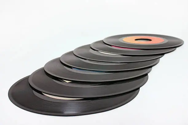 An isolated pile of 45 records.  Shallow DOF.  Focus is on the closest records.