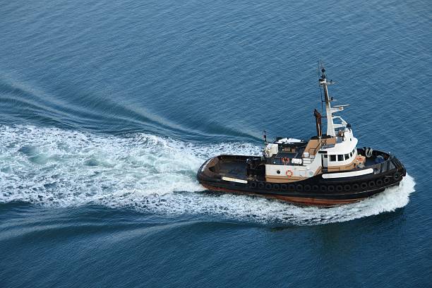 schlepper in vancouver - tugboat stock-fotos und bilder