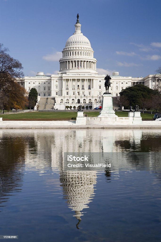 United States Capitol Building with Reflection United States Capitol Building Reflected in Water of Reflecting Pool American Culture Stock Photo