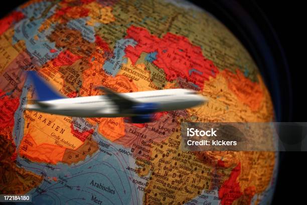 Airliner Flying Around Globe Stock Photo - Download Image Now - Airplane, Blurred Motion, Business