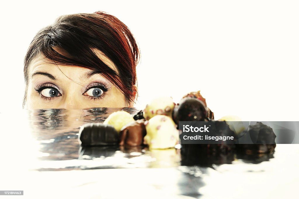 Chocolate story I : Ooooh! Staring at chocolate. Focus is on the eyeshttp://www.lisegagne.com/images/casual.jpg Adult Stock Photo