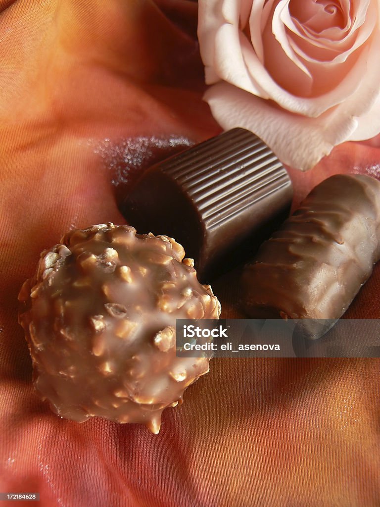 Chocolate and rose. Rose and chocolate. Anniversary Stock Photo