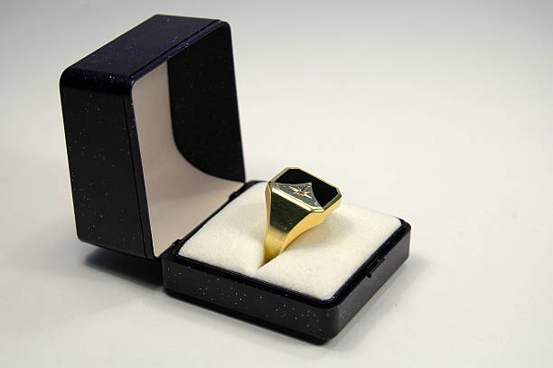 Signet ring in a box white isolated stock photo