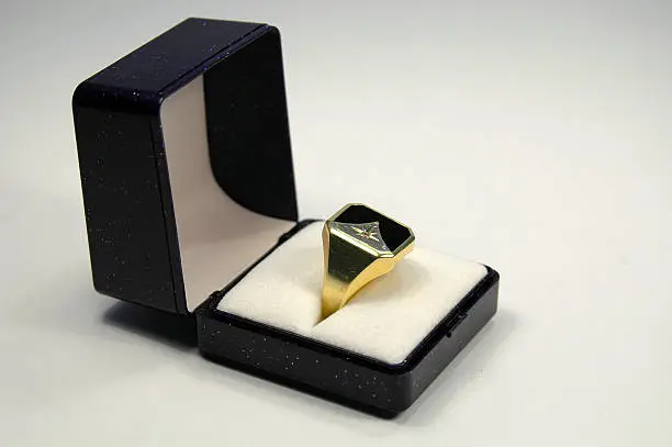 Signet ring in a box white isolated