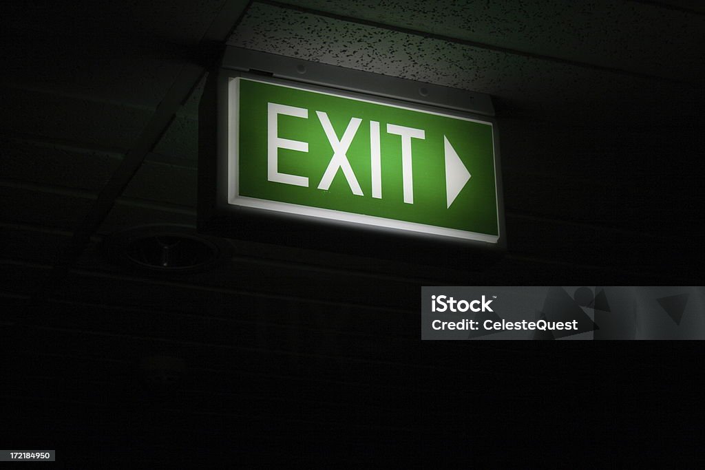 Sign - Illuminated Emergency Exit Illuminated Emergency Exit sign. Exit Sign Stock Photo