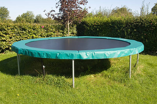 trampoline outdoor fun trampoline stock pictures, royalty-free photos & images