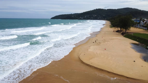 istock Beach with white waves and sandy beach, Coast with waves. 1721854551