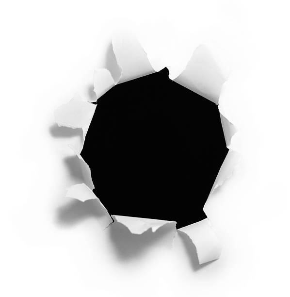 istock Black Hole Ripped Into a Piece of Paper 172185533