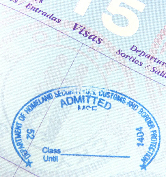 istock Blue passport page with oval stamp 172185726