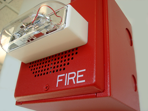 Fire alarm close-up (flashlight and speaker)