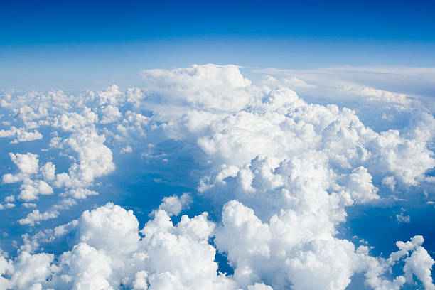 istock Sky view of blue sky and puffy white clouds 172186728