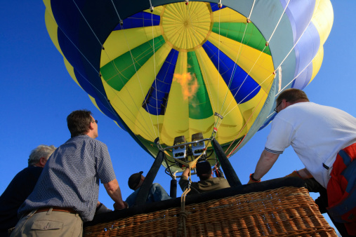 ballooning - holding the gondola before starting; passengers are already on board. 2 minutes to startMore images see in my portfolios: