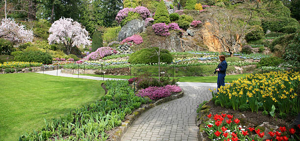 istock Springtime At Butchart Gardens With Woman 172186836