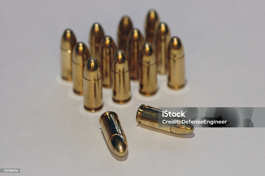 Some 9 mm Bullets 14 9 mm FMJ bullets Millimeter Stock Photo