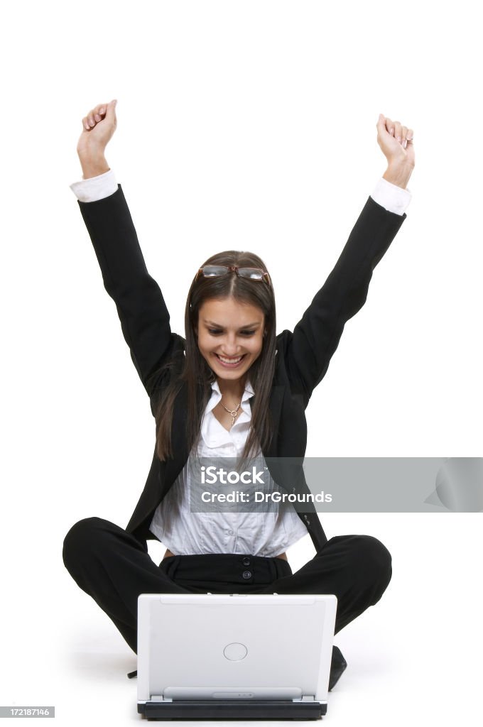 Good News travel fast A young lady with a computer on white background. Excitement Stock Photo