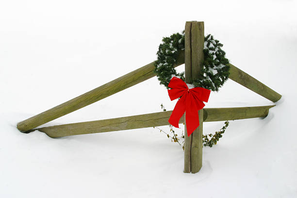 istock Christmas Holiday Wreath With Bow On Fence 172187171