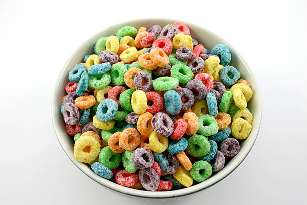 fruit cereal 2 of 4. fruity cereal in a bowl. white background. loopable elements stock pictures, royalty-free photos & images