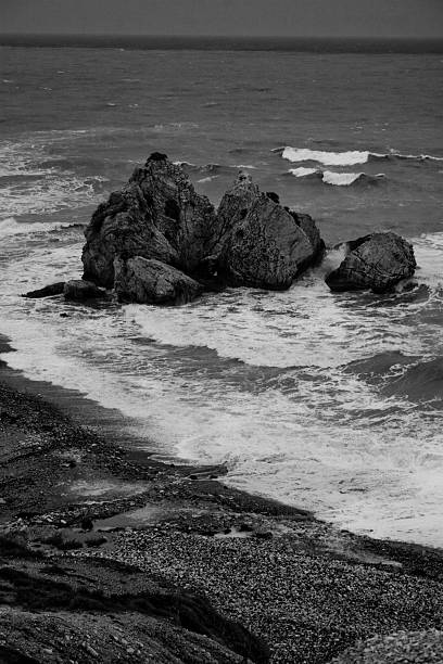 istock ocean waves crashing against rocks 172187562