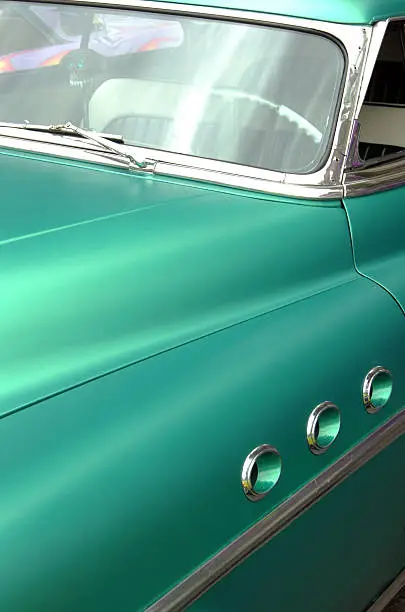Classic 1950's teal green paint on a beefy machine.