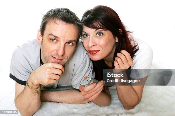 Couple Watching Tv Stock Photo - Download Image Now - 20-29 Years, Adult, Adults Only