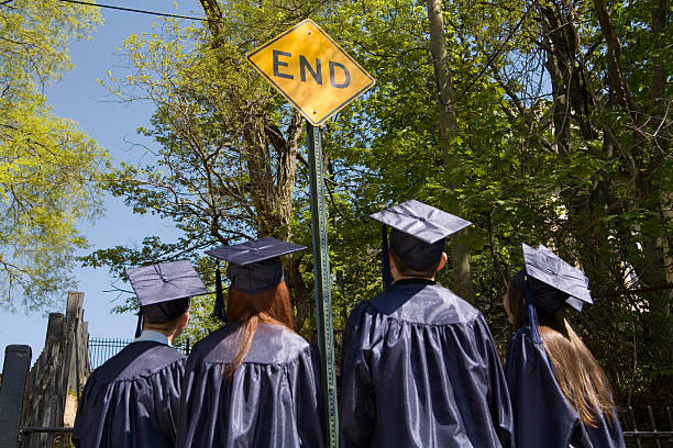 istock Graduates at End street sign 172188891