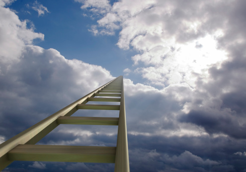 An extremely long ladder leading to the blue sky.